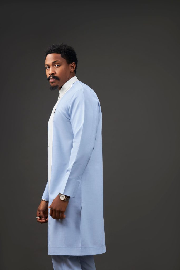 The Abuja man wearing Soso Africa Koles Collection charcoal kaftan — modern Nigerian designer menswear
