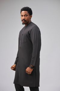 The Abuja man wearing Soso Africa Koles Collection charcoal kaftan — modern Nigerian designer menswear