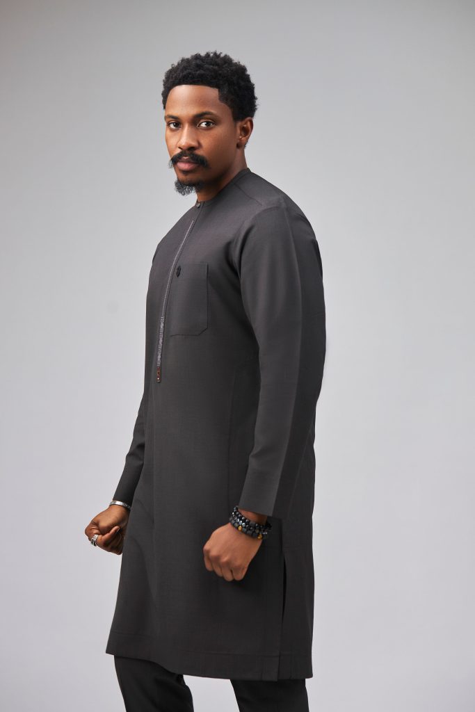 The Abuja man wearing Soso Africa Koles Collection charcoal kaftan — modern Nigerian designer menswear