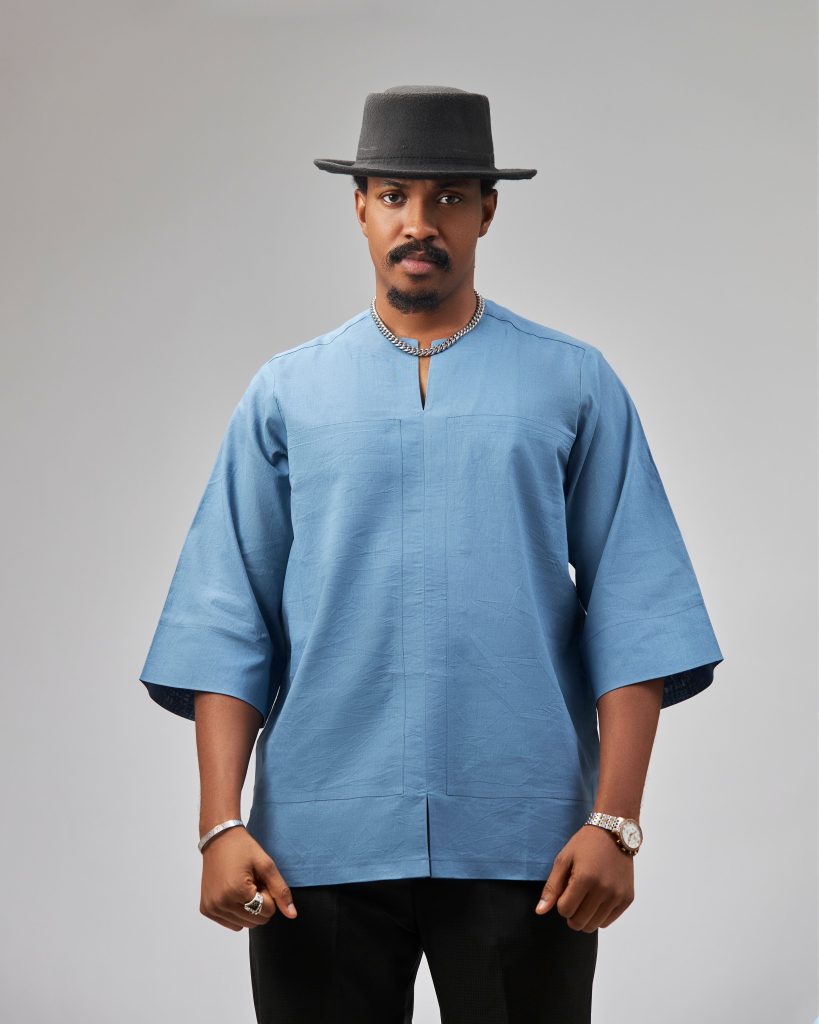The Abuja man wearing Soso Africa Koles Collection charcoal kaftan — modern Nigerian designer menswear